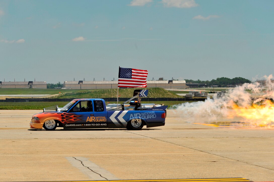 Max Adrenaline jet car performs at the 2011 Joint Service Open House here May 21. The JSOH affords the public an opportunity to meet the men and women of the Armed Forces and to see military equipment through the efforts of active duty guard and reserve servicemembers, as well as civilians employees, retirees and family members. (U.S. Air Force photo by Senior Airman Perry Aston) (Released)