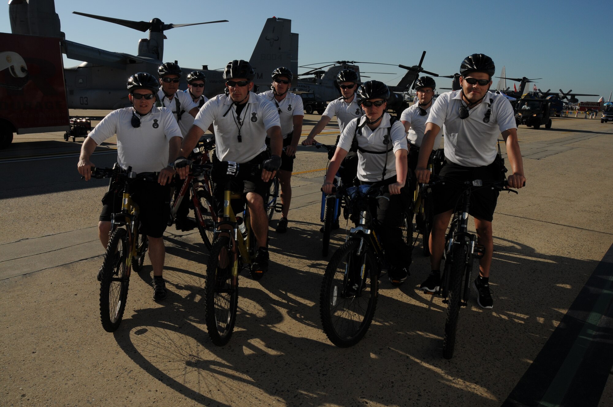 Bike patrol officers from security forces are one of many units keeping the public safe at the Annual Joint Service Open House Andrews Air Show. JSOH affords the public an opportunity to meet the men and women of the Armed Forces and to see military equipment from the Navy, Marines, Army, Air Force, and Coast Guard.  JSOH is planned and conducted through the efforts of active duty, guard and reserve service members, as well as civilian employees, retirees and family members. (U.S. Marine photo/Staff Sgt. Leonard Langston) 