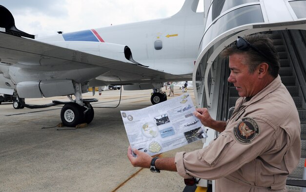 Mr. Chuck Blalock, National Air Security Operations Center detection enforcement officer, offers education and insight about the Orion P-3 aircraft to all guests who visit the P-3's static display at the Joint Base Andrews, Md., 2011 Joint Service Open House May 20. The 2011 JSOH affords the public an opportunity to meet the men and women of the Armed Forces and to see military equipment through the efforts of active duty, guard and reserve servicemembers, as well as civilian employees, retirees and family members. (U.S. Air Force photo by Airman 1st Class Lindsey A. Beadle)
