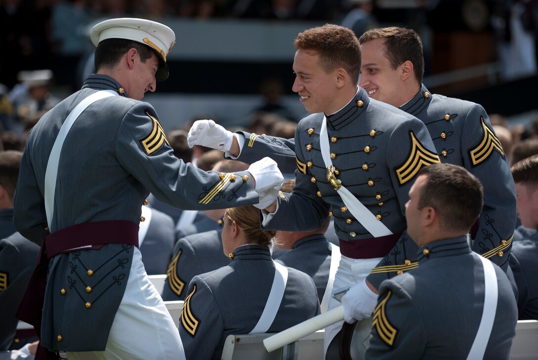 Cadets congratulates one another on their graduation during commencement ceremonies at the U.S. Military Academy at West Point, N.Y., May 21, 2011.