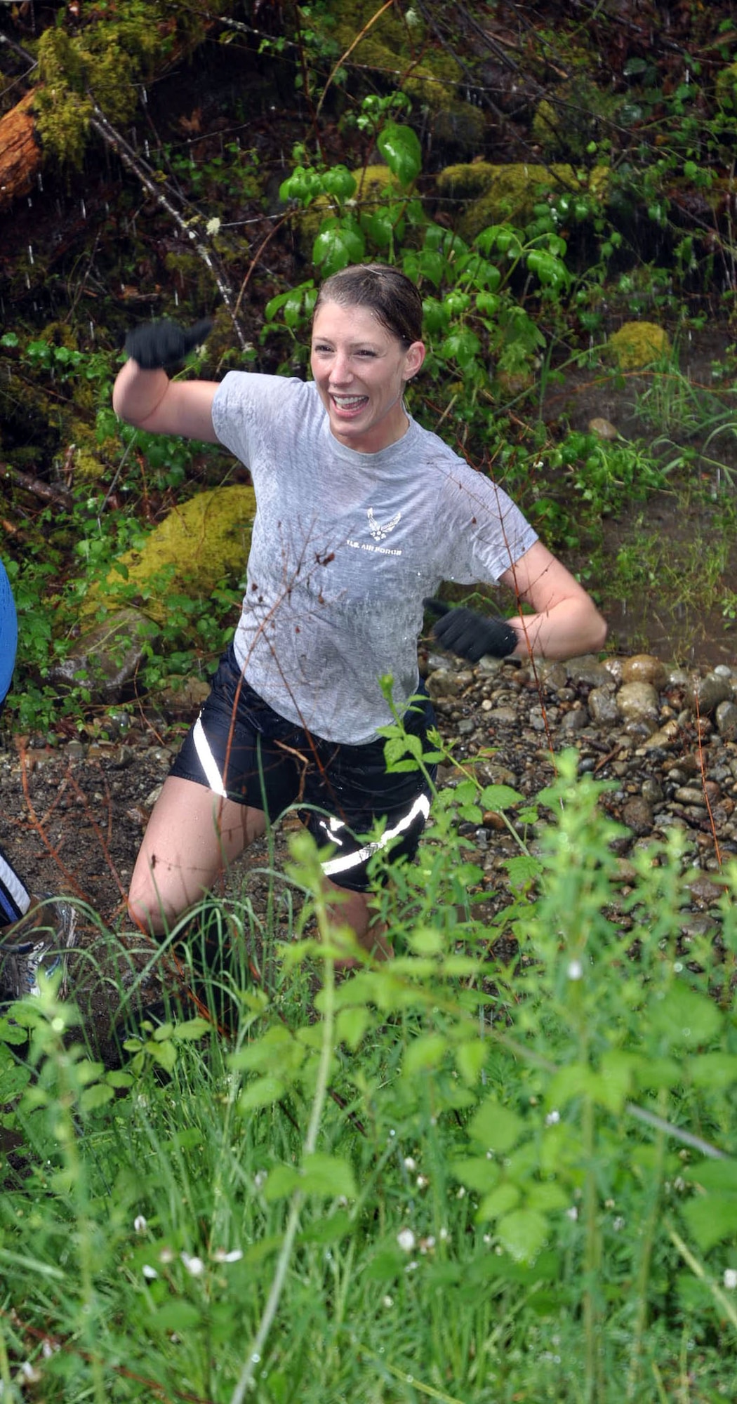 2nd Lt. Lori Fiorello dominates the water strike along the 6th Annual Down and Dirty Mud Run Saturday at Joint Base Lewis-McChord.  Lt. Fiorello won the Air Force fitness award for 222 push-ups in 10 minutes.  She is a stellar Reservist always motivating others to keep in shape.  (U.S Air Force Photo by 2nd Lt. Denise Hauser/Released)