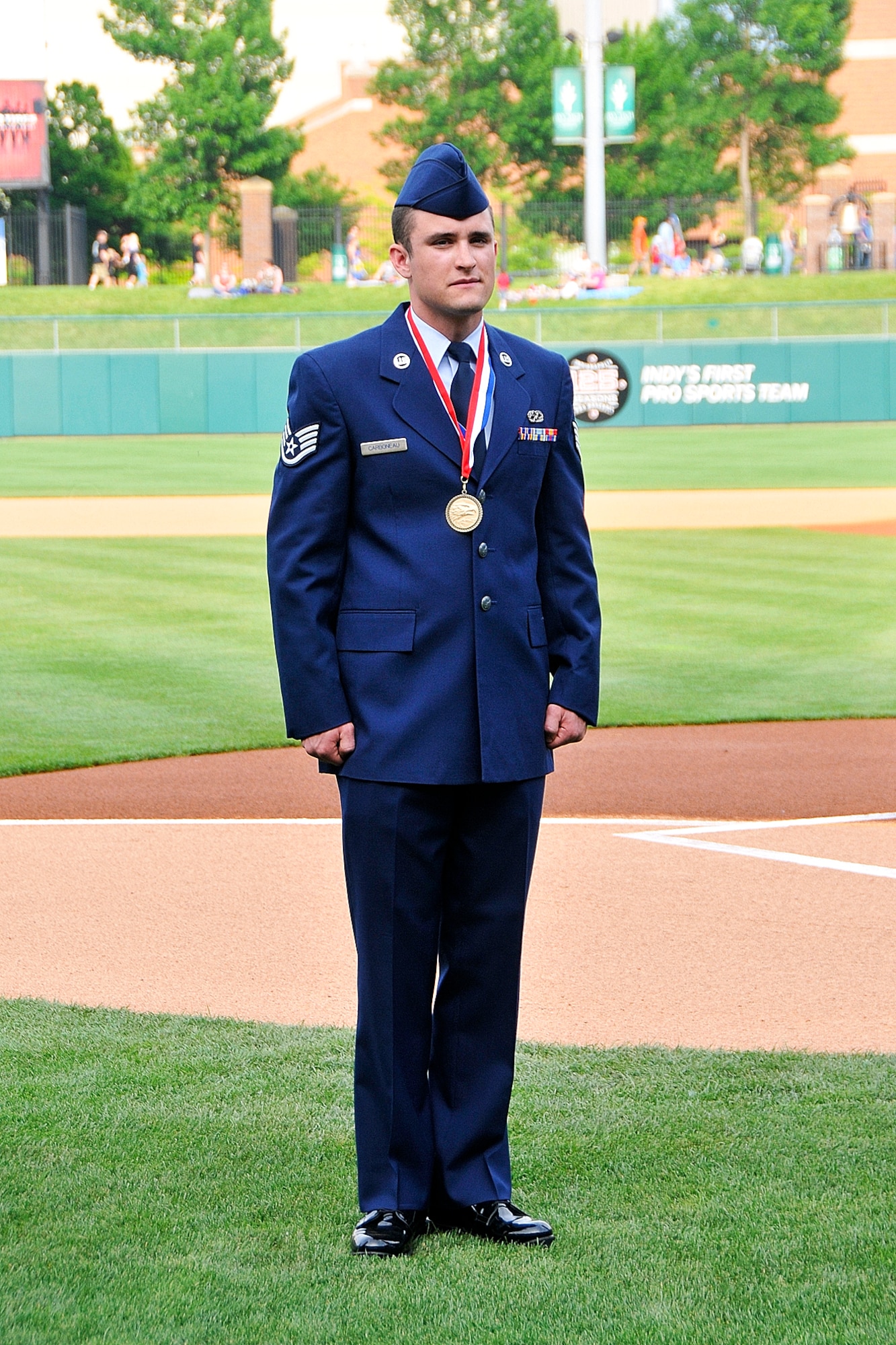 Indiana Air National Guard Staff Sgt. Andrew Carboneau stands on Victory Field, home of the Indianapolis Indians, in Indianapolis, Ind. on May 20, 2011.  Carboneau was just awarded Airman of the Year for 2010 for the Indiana Air National Guard and was being presented the award at the Armed Forces Day Picnic.  Photo by Indiana Air National Guard Staff Sgt. Justin Goeden. RELEASED