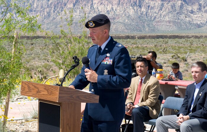 LAS VEGAS --Col. Kit Lambert, 99th Security Forces Group commander, speaks during the 6th annual Defending Freedom Memorial dedication ceremony at the Red Rock National Conservation Area May 14, 2011. Hosted annually, the event honors fallen servicemembers with ties to Nevada and provides a forum for the community to express its appreciation for this sacrifice. The Defending Freedom Memorial was initially dedicated in 2005 and is comprised of seven sandstones with the engraved names of Nevada's fallen servicemen and women. This year, the names Nellis Airmen Senior Airman Michael Buras, Staff Sgt. David Smith, 1st Lt. Joel Gentz and Capt. David Wisniewski were added to the memorial. All four Airmen were lost in 2010 while supporting operations in Afghanistan.  (U.S. Air Force photo by Airman 1st Class Jamie L. Nicley)
