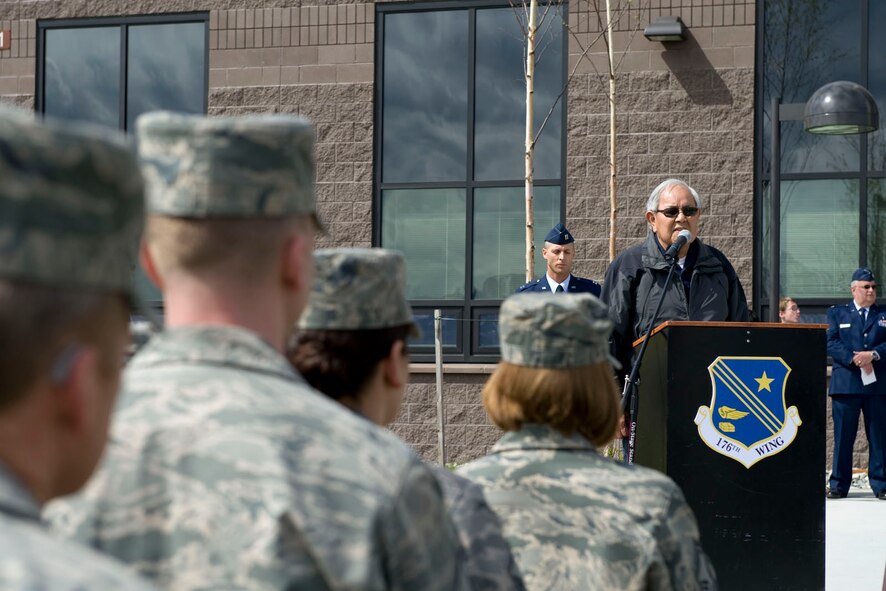 JOINT BASE ELMENDORF-RICHARDSON, Alaska -- Dena?ina elder Ondola from the native village of Eklutna performs a blessing of the land that is the new home of the 176th Wing, Alaska Air National Guard, May 21, 2011. Along with the blessing, the wing dedicated a memorial park and members of the Viet Nam Vets Motorcycle Club conducted a Fallen Warrior Ceremony in celebration of Armed Forces Day. In February, the wing moved from Kulis Air National Guard Base to Joint Base Elmendorf-Richardson per the 2005 Defense Base Realignment and Closure proposal. Alaska Air National Guard photo by Master Sgt. Shannon Oleson.