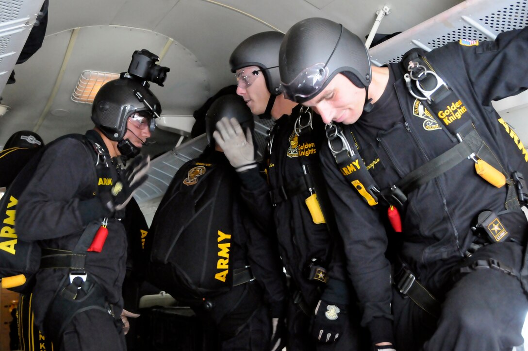 Members of the U.S. Army Golden Knights get into the spirit  during the 2011 Joint Service Open House here May 22.The 2011 JSOH affords the public an opportunity to meet the men and women of the Armed Forces and to see the military equipment from the Navy, Marines, Army, Air Force and Coast Guard. The 2011 JSOH is a planned and conducted through the efforts of active duty, guard and reserve servicemembers, as well as civilian employees, retirees and family members. (U.S. Air Force photo by Airman 1st Class Tabitha N. Haynes)