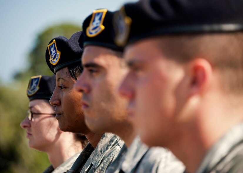 Members of the 96th Security Forces Squadron, stand in formation during a Retreat ceremony at Eglin’s All Wars Memorial May 20.  The ceremony closed out a week of activities by base security forces and local law enforcement in celebration of National Police Week.  (U.S. Air Force photo/Samuel King Jr.)