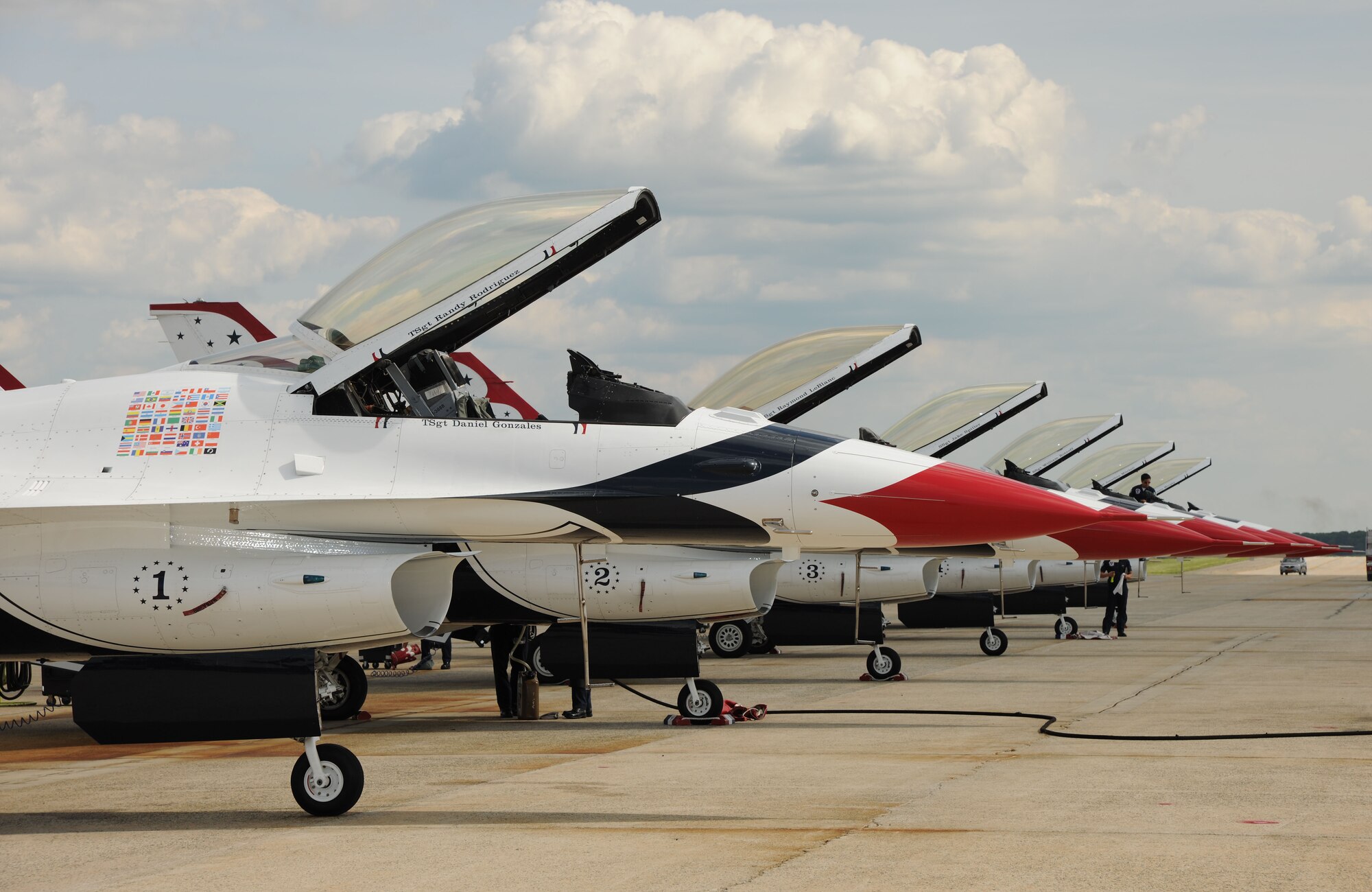 The U.S. Air Force Thunderbird's flight demonstration team aircraft stand ready for their post performance inspection and maintenance following their demonstration at the 2011 Joint Service Open House here May 21. The JSOH affords the public an opportunity to meet the men and women of the Armed Forces and to see military equipment from the Navy, Marines, Army, Air Force and Coast Guard. The JSOH is planned and conducted through the efforts of active duty, guard and reserve servicemembers, as well as civilian employees, retirees and family members. (U.S. Marine Corps. photo)