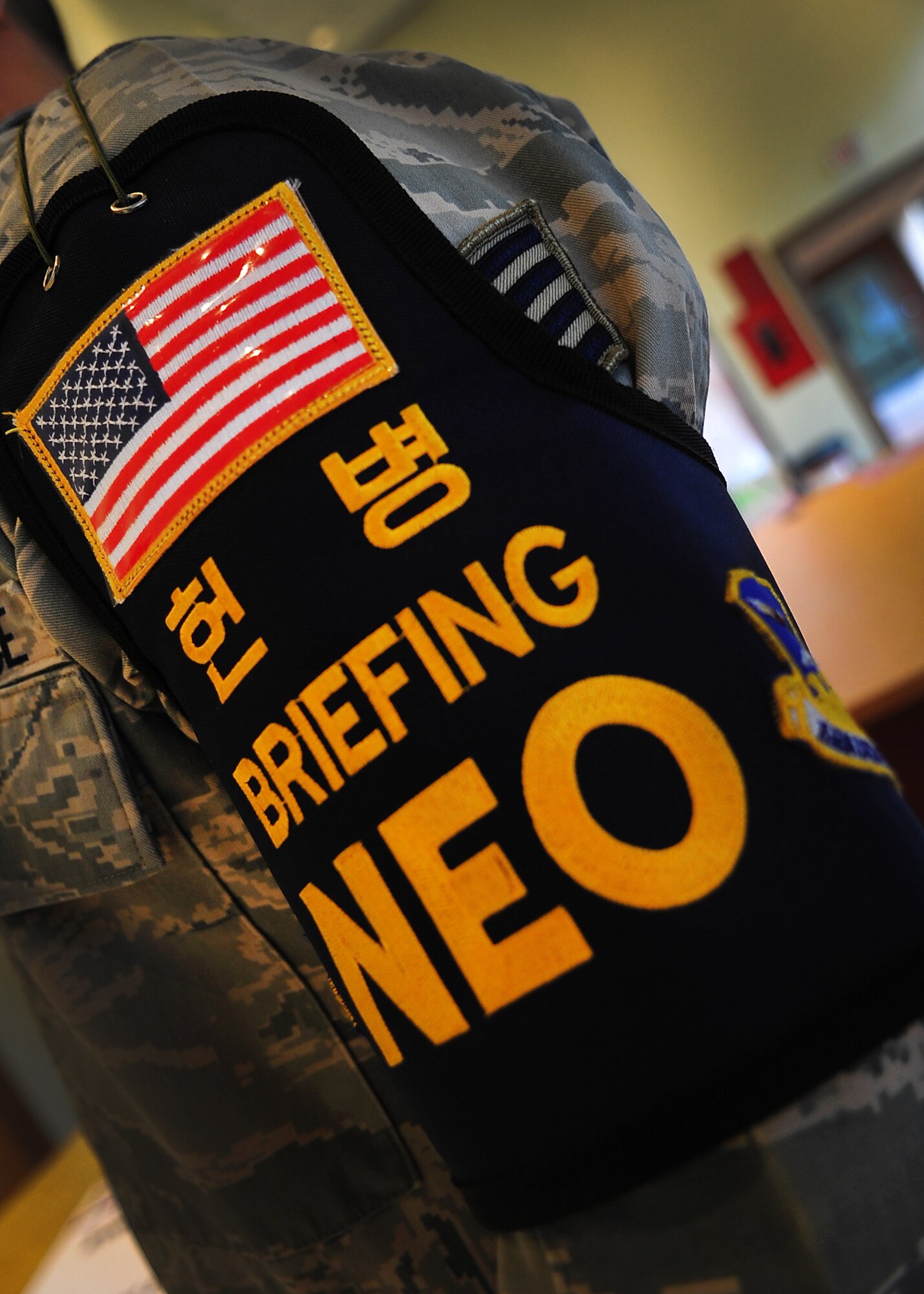 U.S. Army and Air Force personnel prepare to process dependents, non-emergency essential civilians and contractors May 20. Individuals are participating in the Courageous Channel exersice which is held every spring to train servicemembers on registration and evacuation processes. (U.S. Air Force photo/Senior Airman Evelyn Chavez)