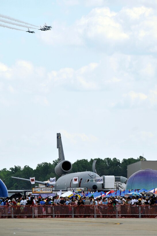 The Thunderbirds perform for a crowd of approximately 100,000 people during the 2011 Joint Service Open House here May 21. JSOH affords the public an opportunity to meet the men and women of the Armed Forces and to see military equipment through the efforts of active duty, guard and reserve servicemembers, as well as civilians employees, retirees and family members. (U.S. Air Force photo by Senior Airman Perry Aston) 