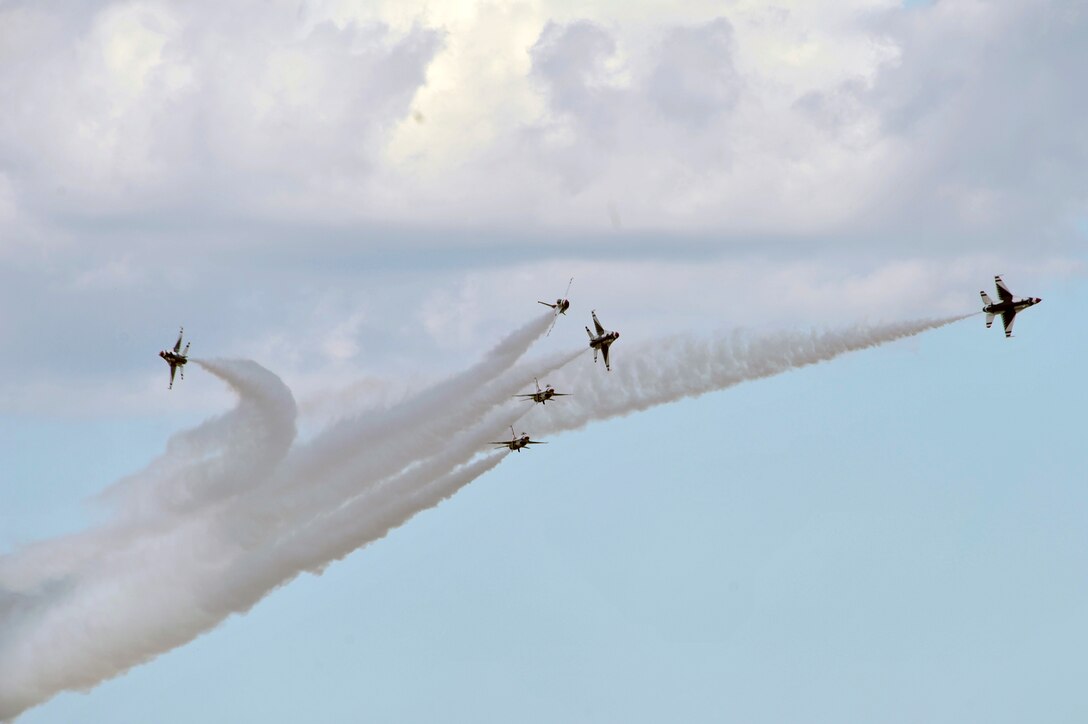 The Thunderbirds perform precision aerobatics during the 2011 Joint Service Open House here May 21. The JSOH affords the public an opportunity to meet the men and women of the Armed Forces and to see military equipment through the efforts of active duty, guard and reserve servicemembers, as well as civilians employees, retirees and family members. (U.S. Air Force photo by Senior Airman Perry Aston) (Released)