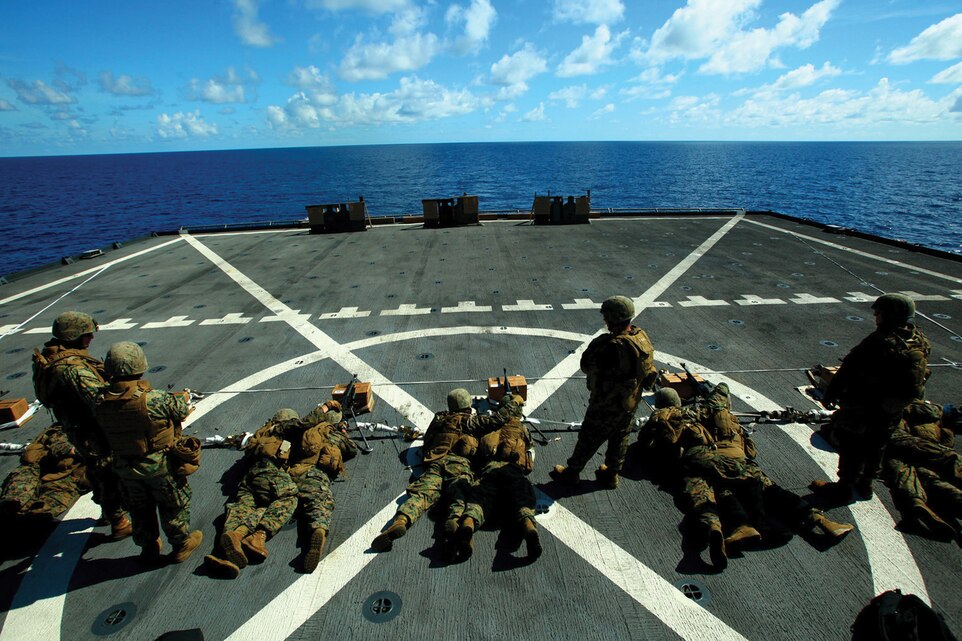 Marines with Landing Force Company fire the M240B machine gun during a live-fire drill May 23 aboard the amphibious transport dock ship USS Tortuga. The Marines are participating in Cooperation Afloat Readiness and Training 2011. CARAT is a series of bilateral exercises held among U.S. and Southeast Asian defense forces with the goals of enhancing regional cooperation, promoting mutual trust and understanding, and increasing operational readiness. Augmented with staff from III Marine Expeditionary Force, the Marines comprising the landing force are volunteers from 2nd Battalion, 23rd Marine Regiment, 4th Marine Division and 4th Assault Amphibian Battalion, 4th Marine Division.