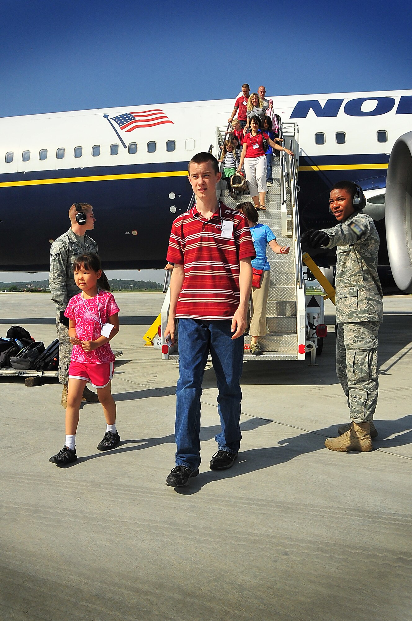 During an Emergency Management Exercise, Osan responders practiced a newly drafted humanitarian evacuation plan ‘Operation Tomdachi’ here May 23.  The scenario was fairly familiar…Japan experienced a devastating earthquake making it necessary for the Japanese people and Americans stationed in Japan to evacuate the region.  A plane full of Japanese and Americans stationed in Japan were simulated by kids from Osan Middle School.   The kids were armed with bags of simulated vomit and symptom cards placed around their neck, to exercise the processing line.   (U.S. Air Force Photo by/Staff Sgt. Daylena Gonzalez)