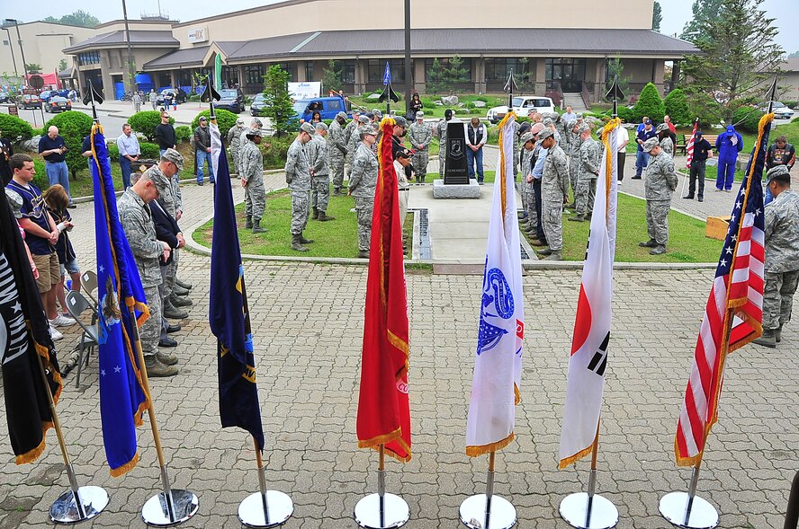 The Air Force Sergeant's Association, Chapter 1556 at Osan Air Base, Republic of Korea hosted a POW/MIA Walkway Dedication Ceremony, here May 21.  The walkway was spondered by Air Force Sergeant's Association, Chapter 1556, the National League of POW/MIA families recieved a three thousand dollar check for the construction of the memorial.  (U.S. Air Force Photo by/Staff Sgt. Daylena Gonzalez)