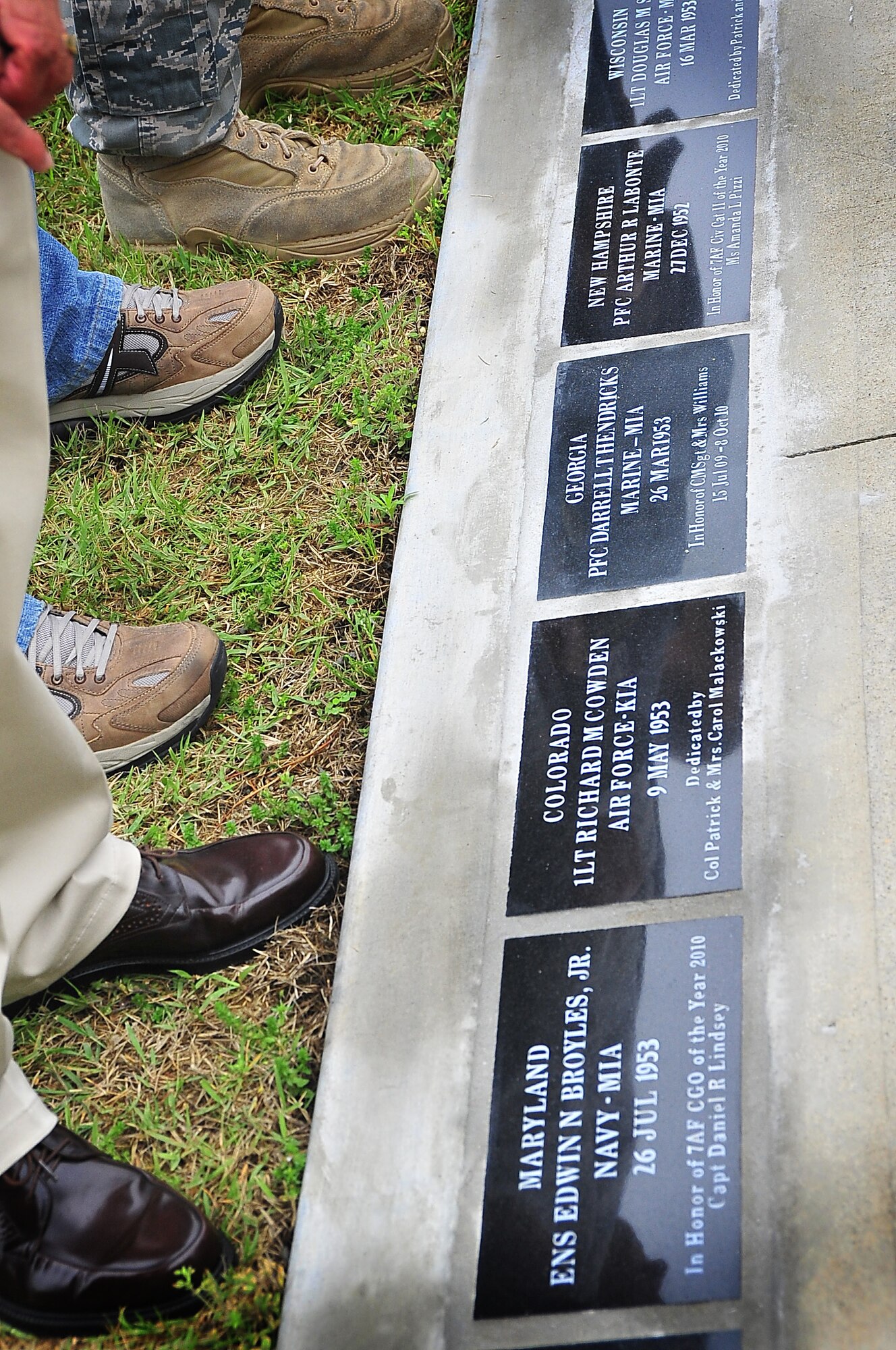 The Air Force Sergeant's Association, Chapter 1556 at Osan Air Base, Republic of Korea hosted a POW/MIA Walkway Dedication Ceremony, here May 21.  The walkway was spondered by Air Force Sergeant's Association, Chapter 1556, the National League of POW/MIA families recieved a three thousand dollar check for the construction of the memorial.  (U.S. Air Force Photo by/Staff Sgt. Daylena Gonzalez)
