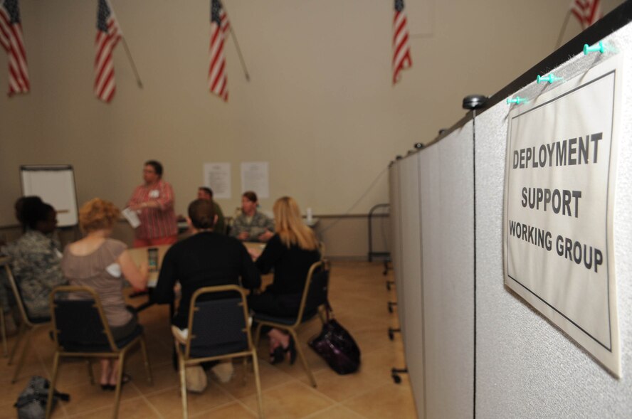 Participants of the Caring for People Forum discuss deployment support in one of the groups at Hoban Hall on Barksdale Air Force Base, La., May 20. The forum, held annually at Air Force level, is an opportunity for bases to bring issues to the attention of those that can make a difference.  (U.S. Air Force photo/Senior Airman Kristin High)(RELEASED)