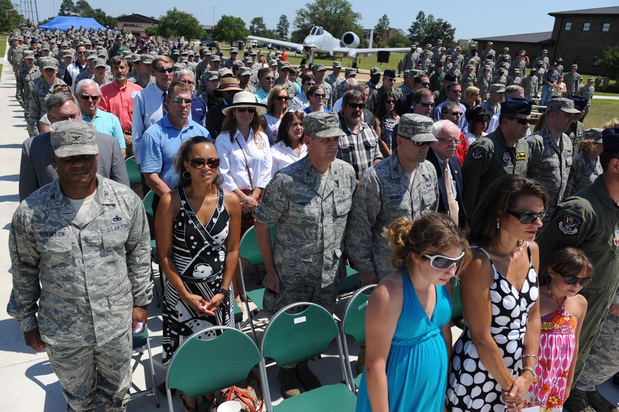 MOODY AIR FORCE BASE, Ga. -- Moody Airmen, family and guests stand during a retreat ceremony while attending a dedication ceremony for the President George W. Bush Air Park at Moody Field May 20. With five currently displayed at the air park, the base has plans on adding three more aircraft to further commemorate Moody history. (U.S. Air Force photo/Staff Sgt. Jamal D. Sutter)(RELEASED)
