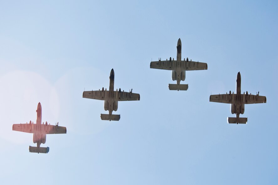 MOODY AIR FORCE BASE, Ga. -- A formation of A-10C Thunderbolt II aircraft make their way through the skies of Moody during a dedication ceremony for the President George W. Bush Air Park at Moody Field May 20. The A-10 is one of five aircraft displayed at the air park. (U.S. Air Force photo/Staff Sgt. Jamal D. Sutter)(RELEASED)

