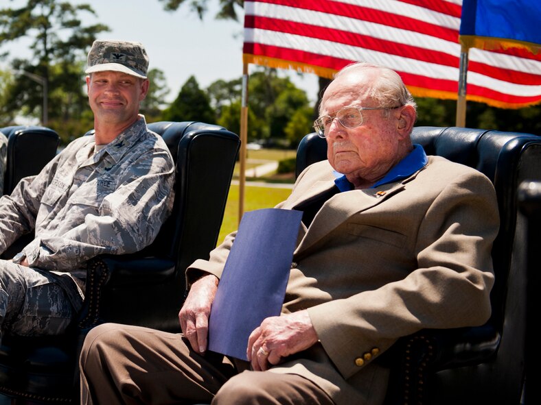 MOODY AIR FORCE BASE, Ga. -- Col. Gary Henderson, 23rd Wing commander, and retired Air Force Col. Clarence Parker receive their introductions during a dedication ceremony for the President George W. Bush Air Park at Moody Field May 20. President Bush attended undergraduate pilot training at Moody from November 1968 to November 1969. (U.S. Air Force photo/Staff Sgt. Jamal D. Sutter)(RELEASED)