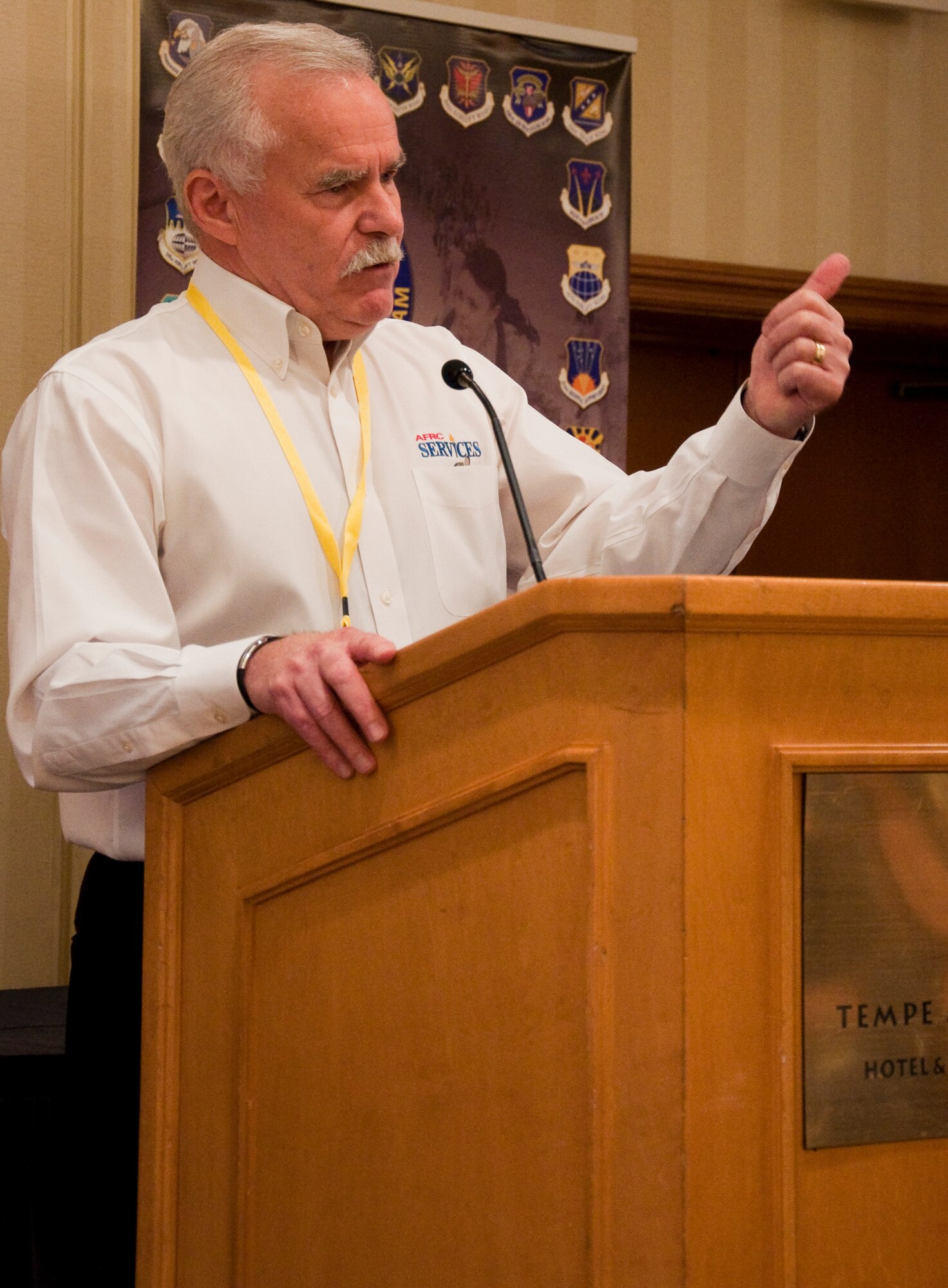 Jerry Cardinal, Air Force Reserve Command Chief of Services, welcomes Reservists, Guardsmen and their families to the western regional Yellow Ribbon Event, May 14-15 at the Tempe Mission Palms Resort in Tempe, Ariz. (U.S. Air Force Photo/Staff Sgt. Erin Smith)
