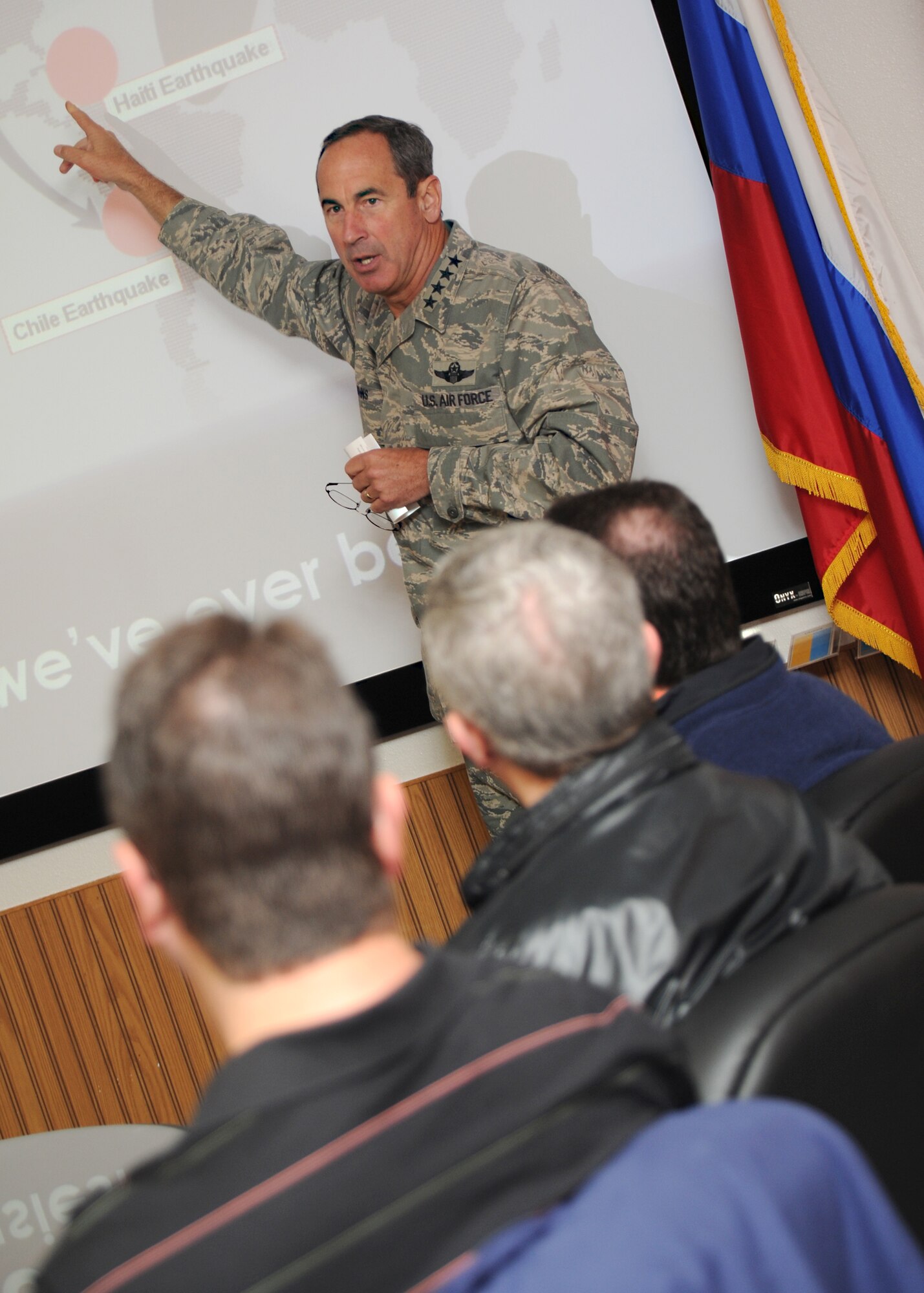 Gen. Raymond Johns Jr., Air Mobility Command commander, gives an AMC mission briefing to AMC civic leaders May 18, 2011, at McConnell Air Force Base, Kan. AMC civic leaders were given the opportunity to visit McConnell to interact with Airmen, ride inside a KC-135 Stratotanker to witness a B-2 Spirit refueling, and meet with fellow community leaders. The civic leader program builds a partnership between the civilian community and Air Force families and leaders to improve understanding of the Air Force mission and challenges. (U.S. Air Force photo/Senior Airman Maria A. Ruiz)