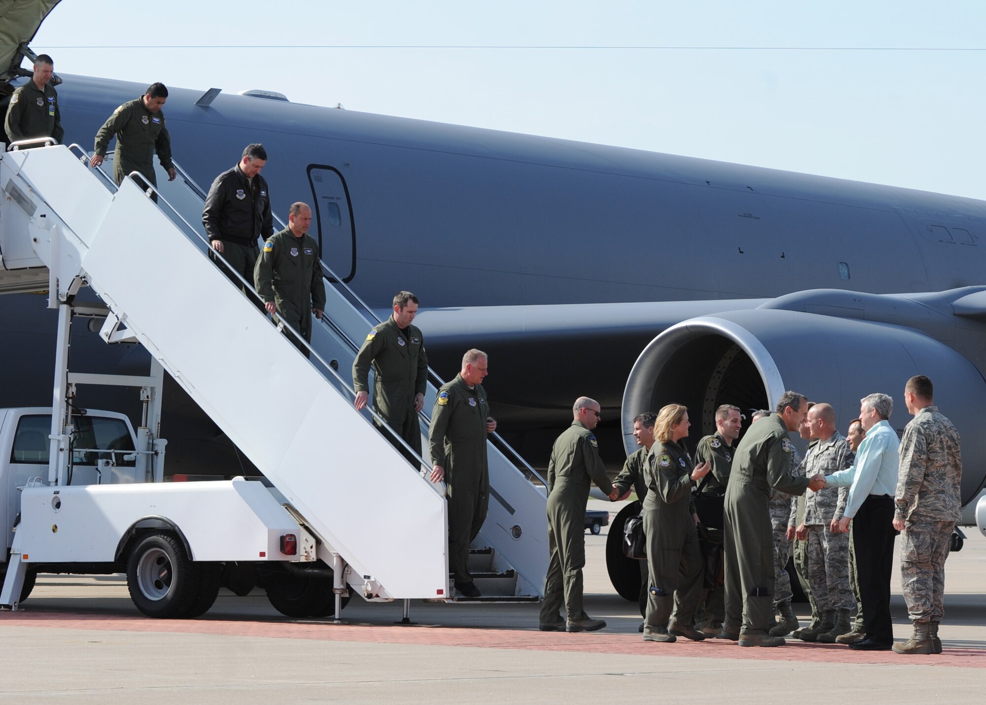 Team McConnell leadership members welcome Gen. Raymond Johns Jr., Air Mobility Command commander, and his staff  to the base for the AMC civic leader conference May 17, 2011, at McConnell Air Force Base, Kan. Fifteen civic leaders from AMC bases visited McConnell and the surrounding Wichita, Kan., community to learn about the command’s mission and Airmen. The civic leader program offers influential community partners the opportunity to engage with servicemembers and learn about the military’s mission. (U.S. Air Force photo/Senior Airman Maria A. Ruiz)