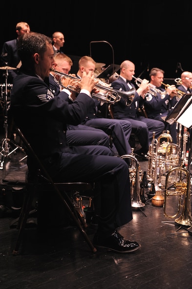 SEYMOUR JOHNSON AIR FORCE BASE, N.C.- Staff Sgt Jonathan Rattay plays the trumpet during the U. S. Air Force Heritage of America Band performance at the Paramount Theater in Goldsboro, May 19, 2011. Sergeant Kennedy is a regional band craftsman and is a native of Plano, Texas. (U. S. Air Force photo/Senior Airman Whitney Lambert)