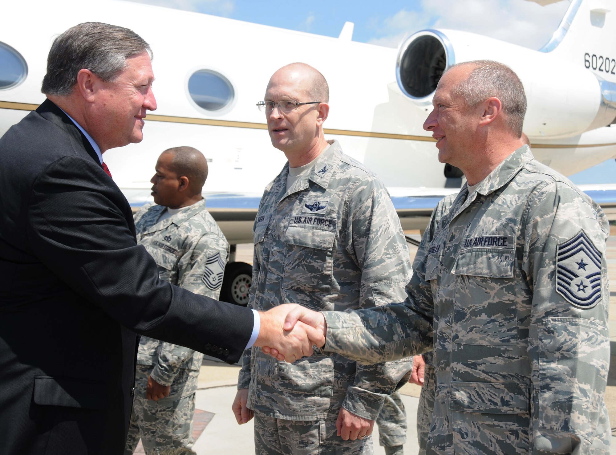 From left, Secretary of the Air Force Michael Donley is greeted by Col. Jay Jensen, 403rd Wing commander, and Chief Master Sgt. Anthony Woitalla, 403rd Wing command chief, during Secretary Donley's visit to Keesler Thursday. Secretary Donley was accompanied by Chief Master Sgt. of the Air Force James Roy.  (U.S. Air Force photo by Kemberly Groue)