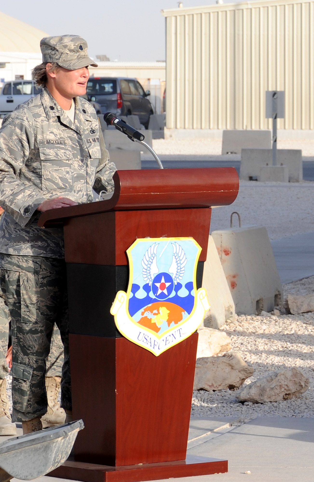 Lt. Col. Marion Moxley, 379th Expeditionary Security Forces Squadron commander, speaks during the police week Retreat Ceremony at an undisclosed location in Southwest Asia, May 21. Police Week honors those who fell defending others and also educates participants on the roles of police and security forces. (U.S. Air Force photo/Staff Sgt. Liliana Moreno)                     