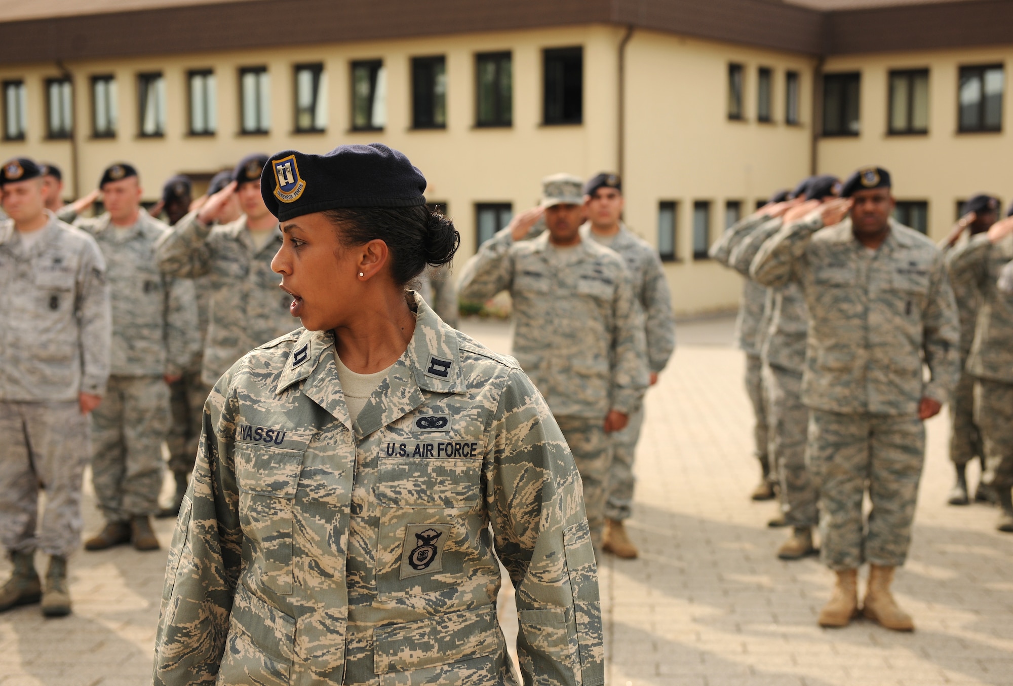 SPANGDAHLEM AIR BASE, Germany – Capt. Lidia Iyassu, 52nd Security Forces Squadron operations officer, commands her flight to order arms during a retreat ceremony here May 20. The retreat ceremony coincided with National Police Week, which honors law enforcement members who have lost their lives in the line of duty for the safety and protection of others. (U.S. Air Force photo/Senior Airman Nathanael Callon)