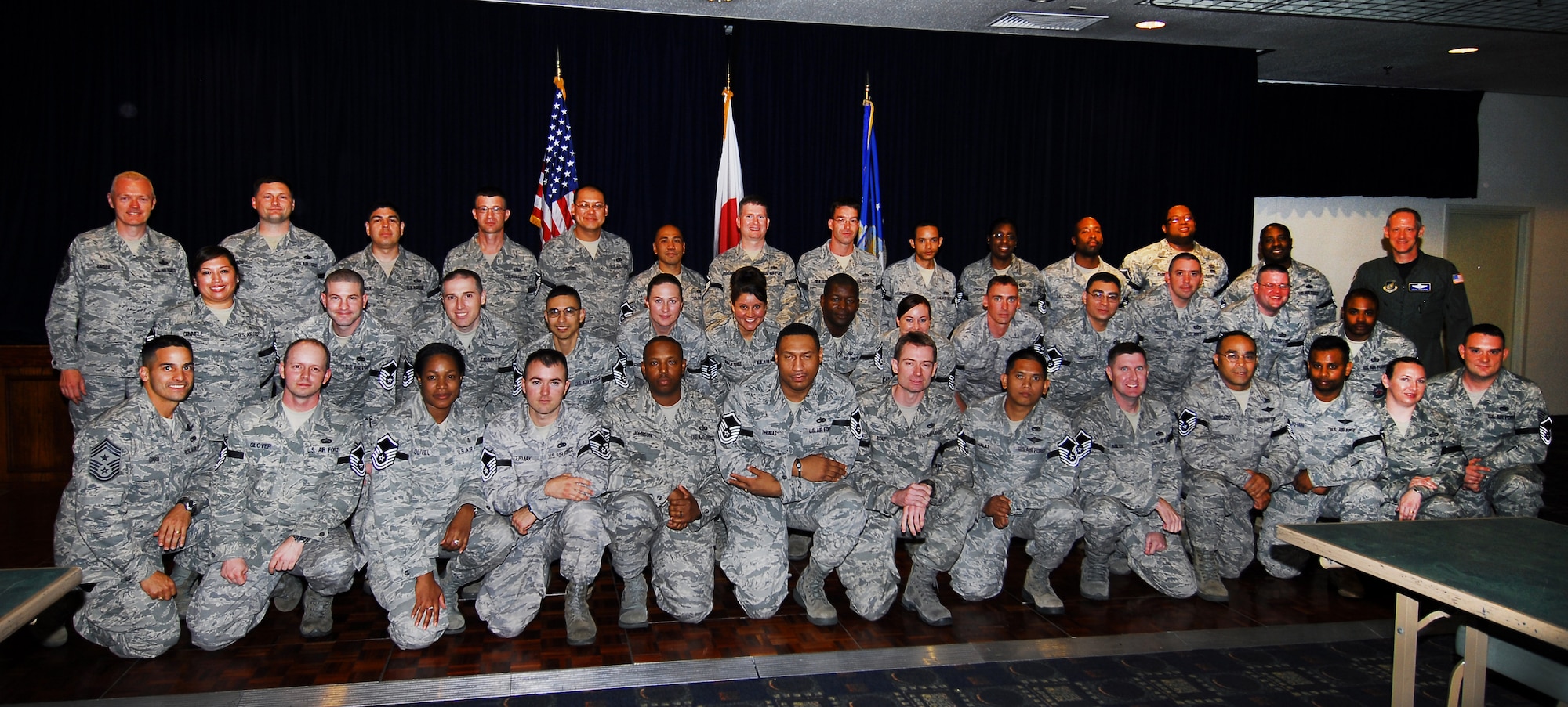 YOKOTA AIR BASE, Japan -- Yokota's newest master sergeants selects pose for a photo during the master sergeant social held at Yokota Air Base, Japan, May 20, 2011. Fifty-two technical sergeants stationed at Yokota AB were selected for promotion to master sergeant. (U.S. Air Force Photo/Airman 1st Class Katrina R. Menchaca)