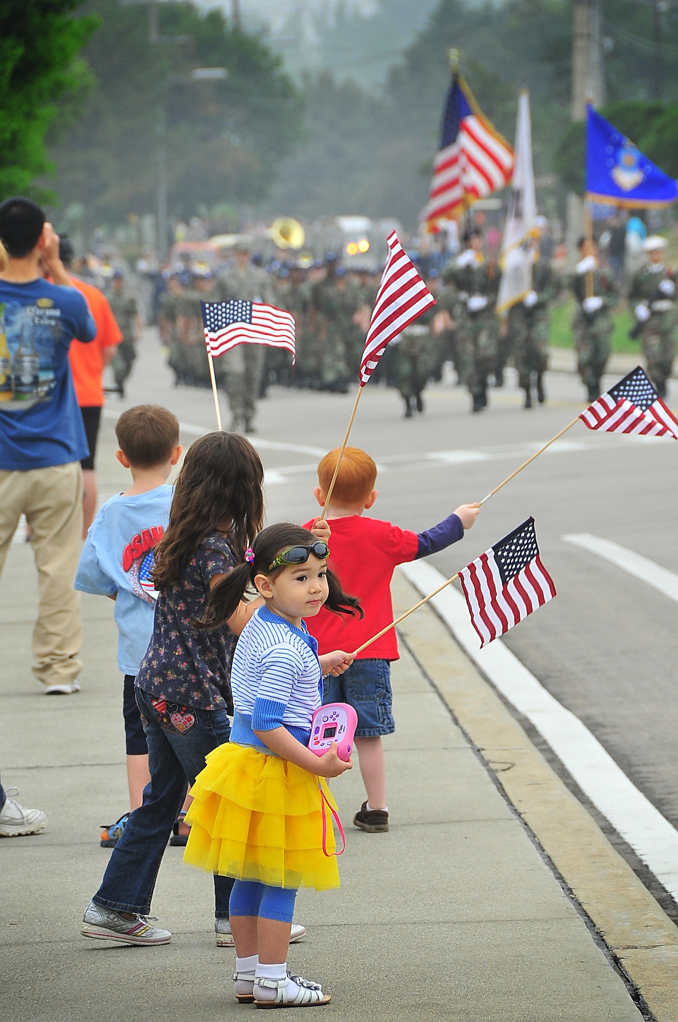 The annual VFW Armed Forces Day Parade was held at Osan Air Base, Republic of Korea, May 21.  Starting at the main gate, more than 25 squadrons and organizations participated, showcasing unit guide-ons and squadron vehicles. (U.S. Air Force Photo by/Staff Sgt. Daylena Gonzalez)
