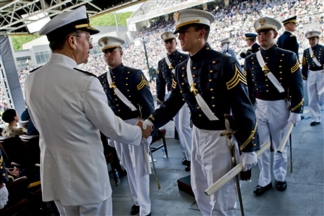 Chairman of the Joint Chiefs of Staff Adm. Mike Mullen, U.S. Navy, congratulates cadets during commencement ceremonies at the U.S. Military Academy at West Point, N.Y., on May 21, 2011.  