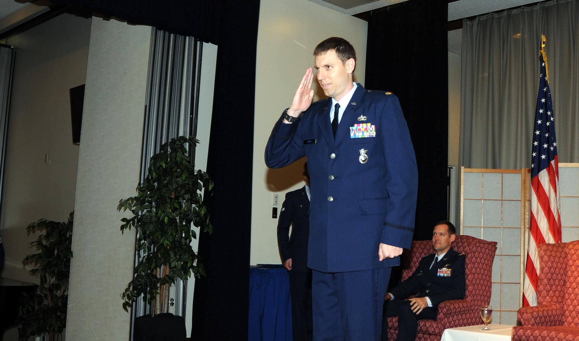 YOKOTA AIR BASE, Japan- Major Steven Lovett, 374th Security Forces Squadron commander, renders his first salute to the men and women of the 374th SFS, during a change of command ceremony at Yokota Air Base, Japan, May 24, 2011. U.S. Air Force Photo/Airman 1st Class Katrina R. Menchaca)