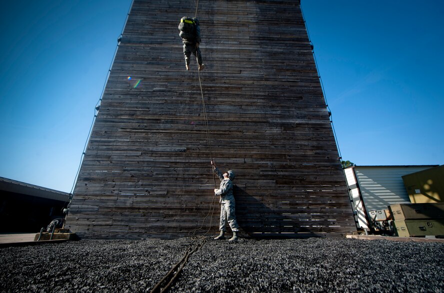 MOODY AIR FORCE BASE, Ga.-- Staff Sgt. Elizabeth Rosato, 820th Combat Operations Squadron Non-commissioned officer of training, holds a repel rope during demonstration and base visit May 19. Lt. Col. John Chianese, 105th Security Forces Squadron commander visited Moody to get firsthand look at the training and abilities of the 820th Base Defense Group. (U.S. Air Force photo/Airman 1st Class Joshua Green)(RELEASED)                   
