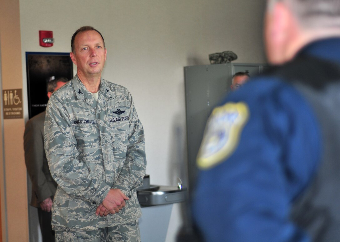 As part of National Police Week 914th Airlift Wing Commander Col. Allan L. Swartzmiller briefs security forces members, May 19, 2011, Niagara Falls Air Reserve Station, NY. Established by a joint resolution of Congress in 1962, National Police Week pays special recognition to those law enforcement officers who have lost their lives in the line of duty for the safety and protection of others. (U.S. Air Force photo by Staff Sgt. Joseph McKee)
