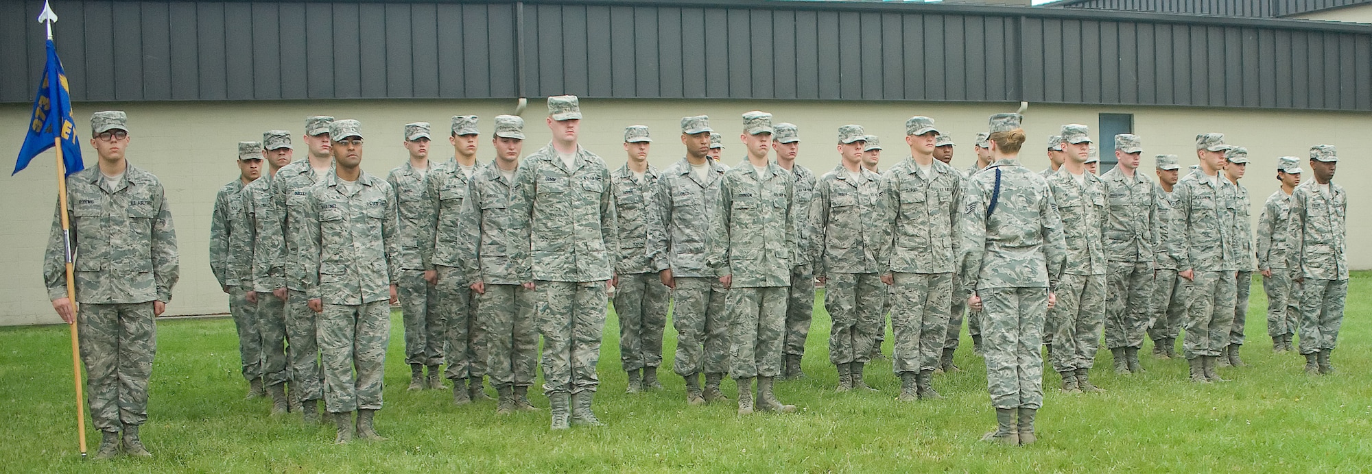373rd Training Squadron Detachment 3 members stand in formation May 24, 2011, at Dover Air Force Base, Del. Det. 3 consists of Airmen in training to be C-5 crew chiefs. (U.S. Air Force photo by Adrian Rowan)