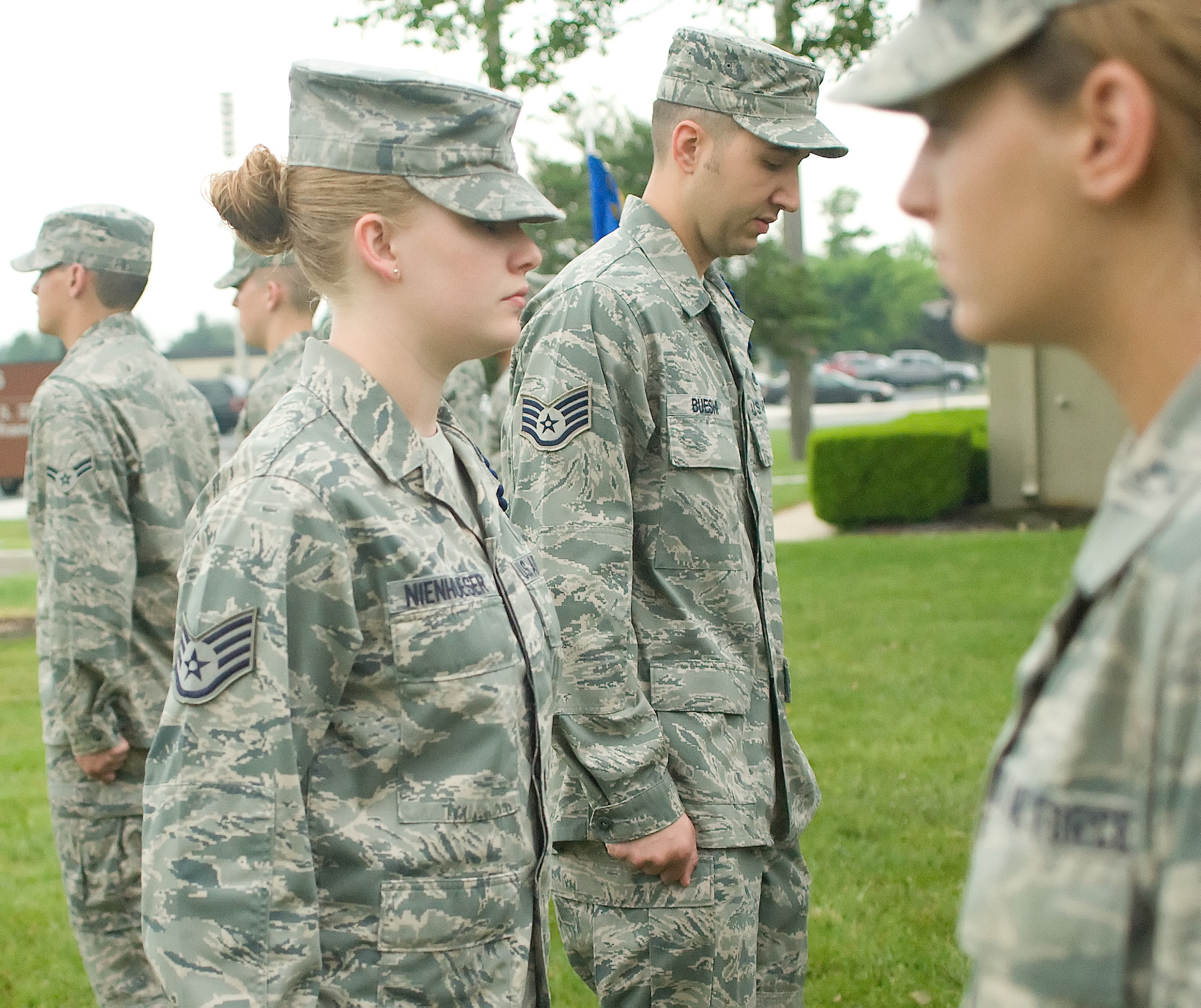 Staff Sgt. Jessica Nienhueser (left), and Staff Sgt. Ali Bueshi, 373rd Training Squadron military training leaders, inspect Detachment 3 Airmen’s appearances May 24, 2011, at Dover Air Force Base, Del. The MTLs assure that Airmen in training retain the standards and discipline taught to them during Basic Military Training. (U.S. Air Force photo by Adrian Rowan)

