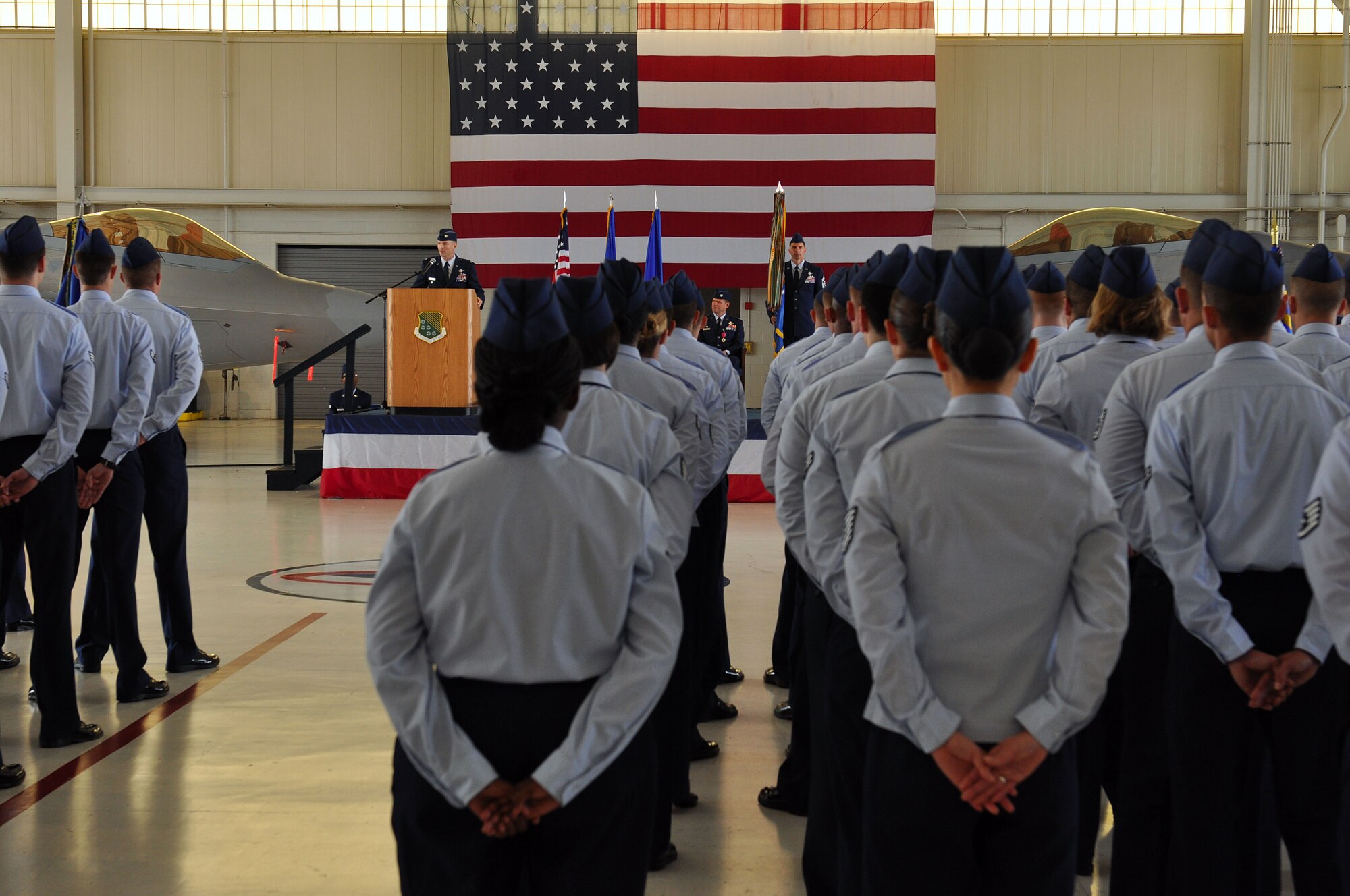 Col. Kevin J. Robbins, 1st Fighter Wing commander, addresses the men and women of the 1 FW during the change-of-command ceremony at Langley Air Force Base, Va., May 23, 2011. Colonel Robbins assumed command of the wing from Col. Matthew Molloy. (U.S. Air Force photo by Tech. Sgt. Christina M. Styer)(RELEASED) 