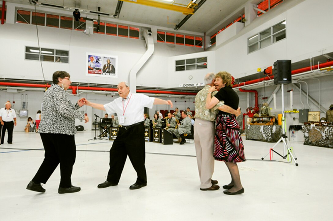 World War II veterans and their wives dance to the songs of the 338th Army band at the Stage Door Canteen, hosted by the 180th Fighter Wing and Honor Flight of Northwest Ohio, May 21 at the 180th Fighter Wing.