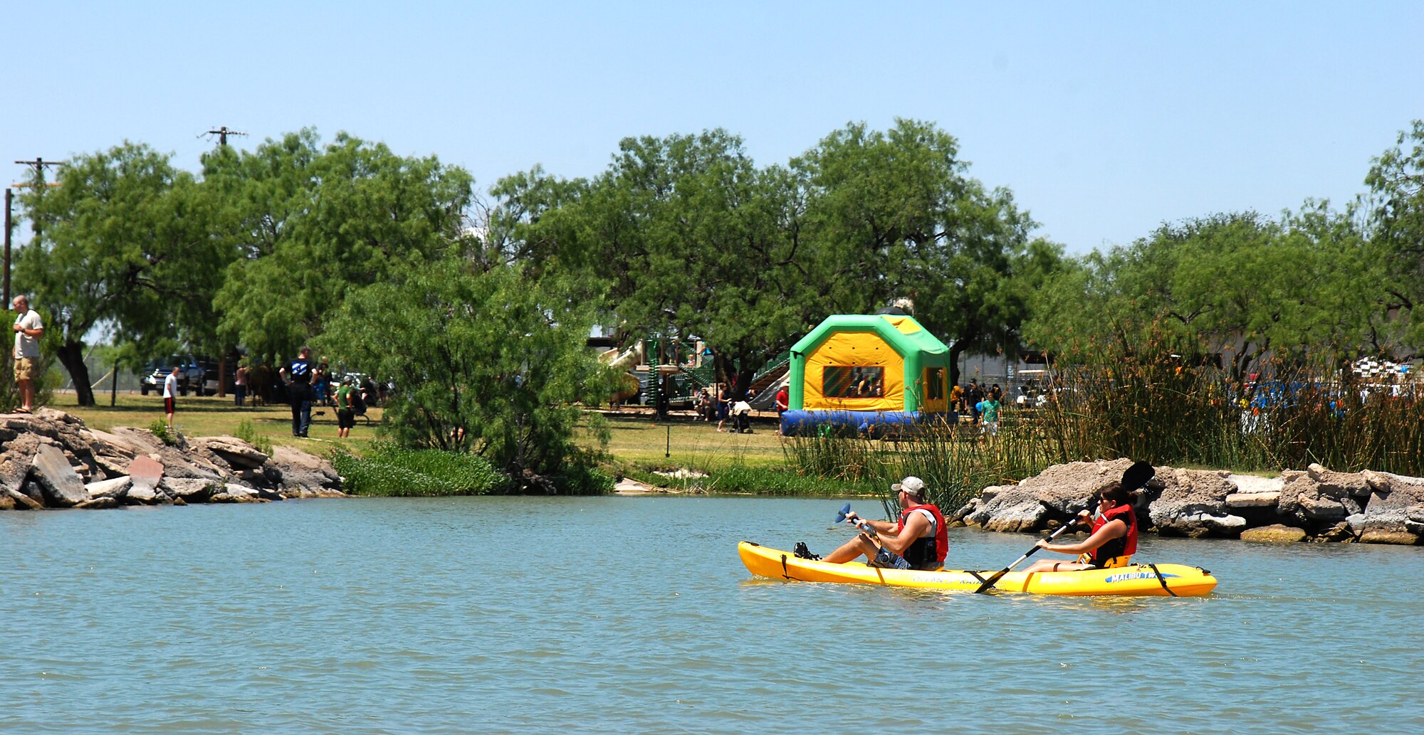 GOODFELLOW AIR FORCE BASE, Texas-- A couple enjoys kayaking on Lake Nasworthy, one of the many attractions offered at the 6th annual Goodfellow Appreciation Day May 23. The event was sponsored by local businesses and included several events- bungee run, rock climbing, food, drinks and music. (U.S. Air Force photo/Airman 1st Class Michael Smith)