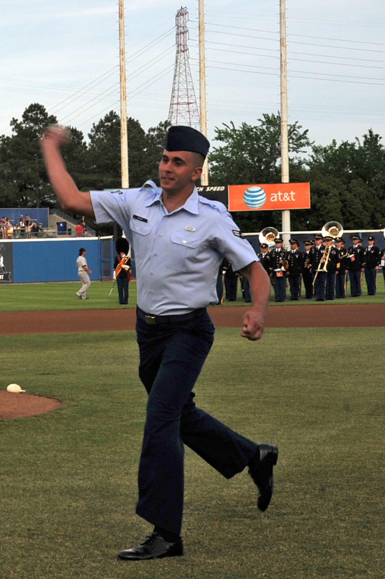 Senior Airman Joshua Wyant, 633d Civil Engineer Squadron heating, ventilating and air conditioning technician, throws the ceremonial first pitch during the Norfolk Tides’ Military Appreciation Night Saturday, May 21, 2011 at Harbor Park Stadium in Norfolk, Va. Airman Wyant earned the honor for his selection as Joint Base Langley-Eustis’ 2010 Airman of the Year. (U.S. Air Force photo by Airman 1st Class)(RELEASED)