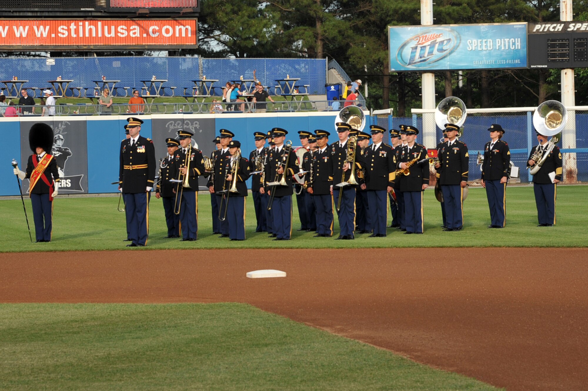 The U.S. Army Training and Doctrine Command Band performs a medley of U.S. military anthems during the Norfolk Tides’ Military Appreciation Night Saturday, May 21, 2011 at Harbor Park Stadium in Norfolk, Va. Events included a presentation of the colors by the U.S. Joint Service Color Guard and first pitches from military members of each branch of the Armed Forces. (U.S. Air Force photo by Airman 1st Class)(RELEASED)