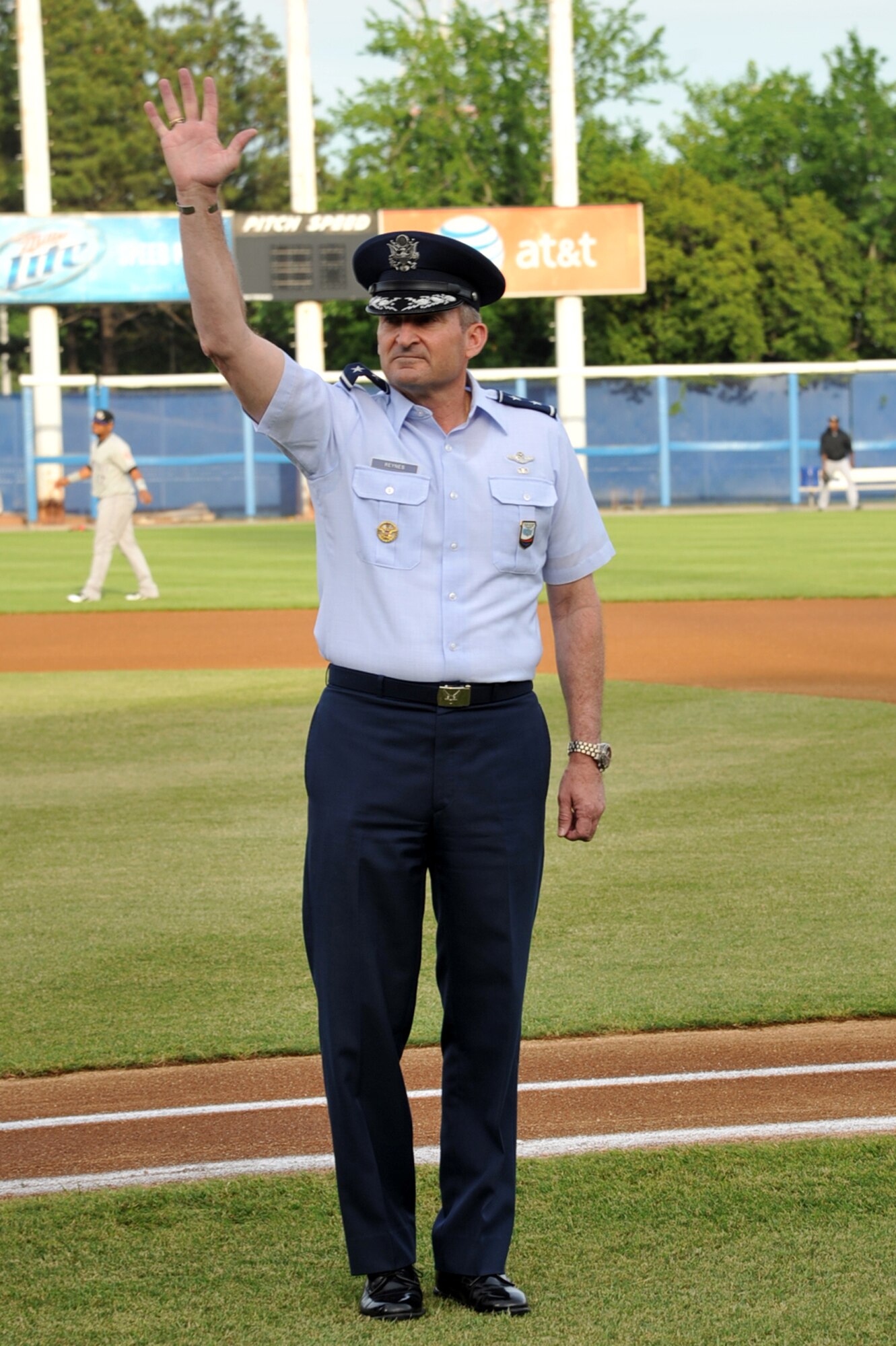 Maj. Gen. Joseph Reynes Jr., Headquarters U.S. Joint Forces Command Joint Concept Development and Experimentation director, waves to the crowd during the Norfolk Tides’ Military Appreciation Night Saturday, May 21, 2011 at Harbor Park Stadium in Norfolk, Va. Events included a presentation of the colors by the U.S. Joint Service Color Guard and first pitches from military members of each branch of the Armed Forces. (U.S. Air Force photo by Airman 1st Class)(RELEASED)