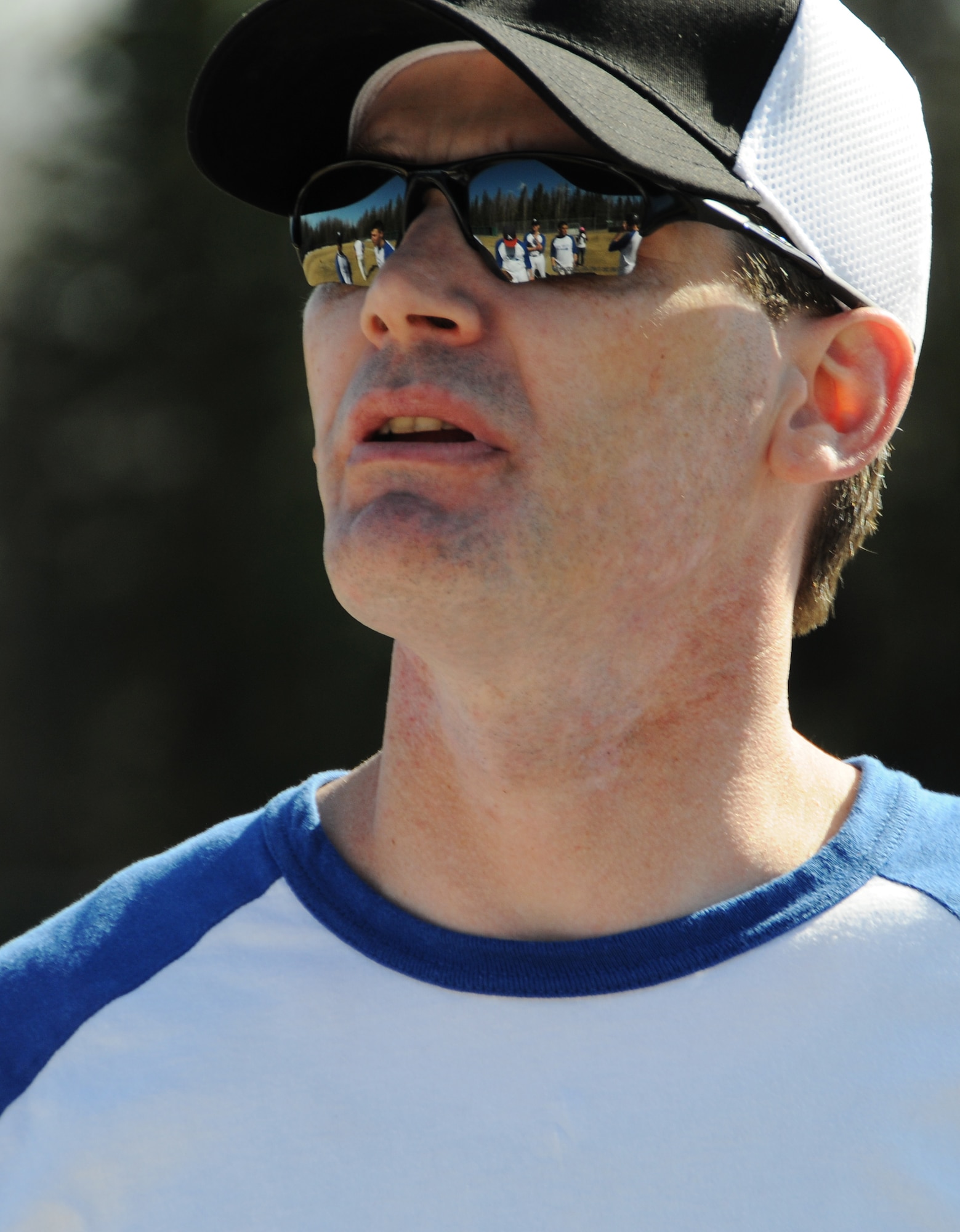 Coach Jesse Robinson talks to his team briefly during practice May 15, 2011, North Pole, Alaska. The Iceman team is a part of the Men's Adult Baseball League and plays against local teams in Fairbanks and North Pole. The MABL is a national baseball league for men 18 and older that provides the opportunity to play real baseball at a competitive level on a regular basis and in a professionally-run environment. Mr. Robinson is the husband of Staff Sgt. Michelle Robinson, a 354th Medical Group pharmacy technician. (U.S. Air Force photo/Senior Airman Rachelle Coleman)