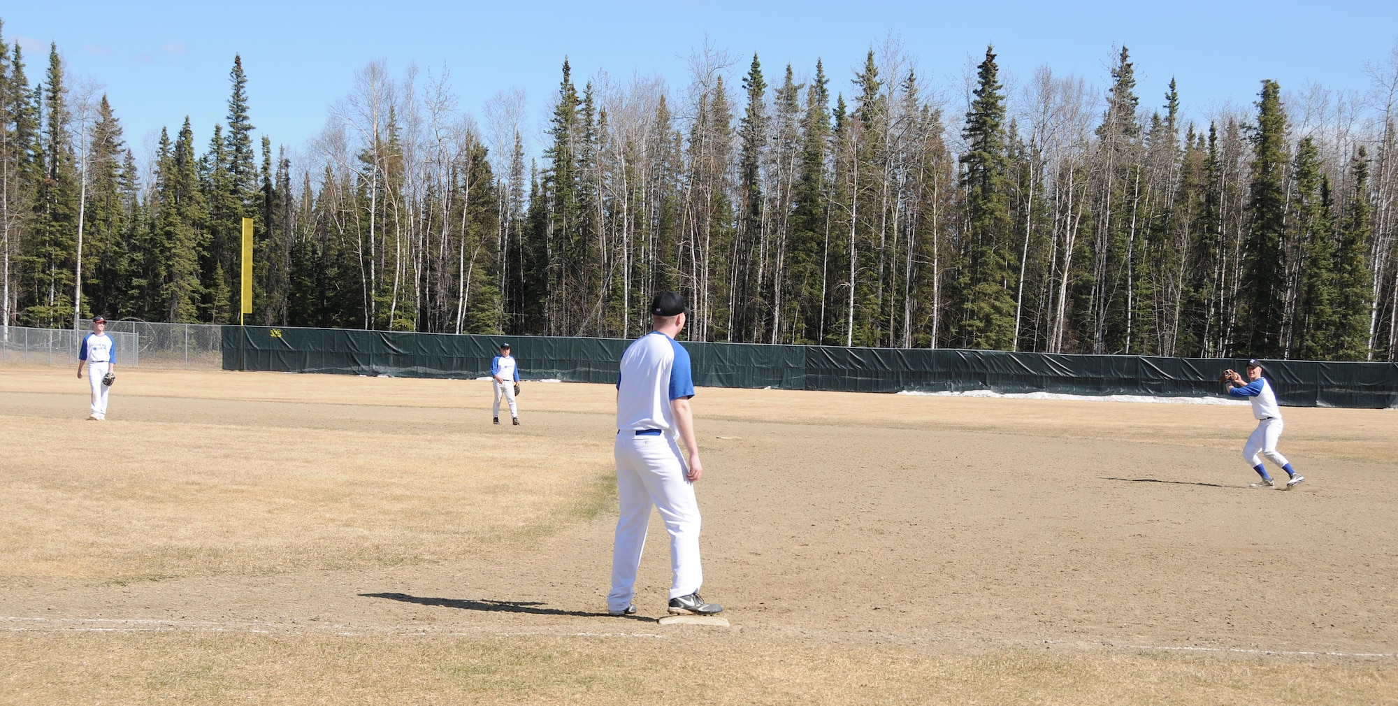 Airmen run drills during practice May 15, 2011, North Pole, Alaska. For those wanting to attend games but aren't able to drive to Fairbanks during the week, the league has worked with the military team to schedule 2 p.m. Sunday games at Newby Field in North Pole. (U.S. Air Force photo/Senior Airman Rachelle Coleman)