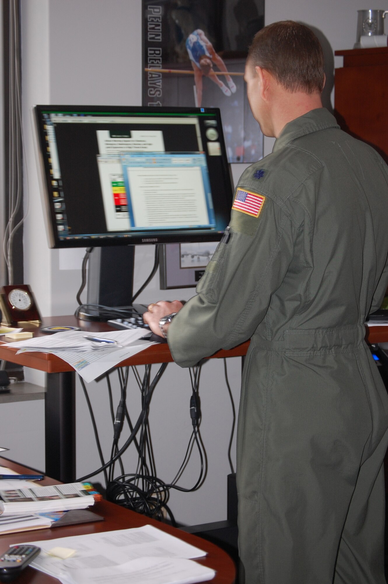 Lt. Col. David Pike, director of operations for the 911th Air Refueling Squadron, was an early-adopter of the elevated work station concept here at the 916th ARW. Colonel Pike started using his new desk in early 2011 to help with his goals in health and fitness. (USAF photo by Maj. Shannon Mann, 916ARW/PA)