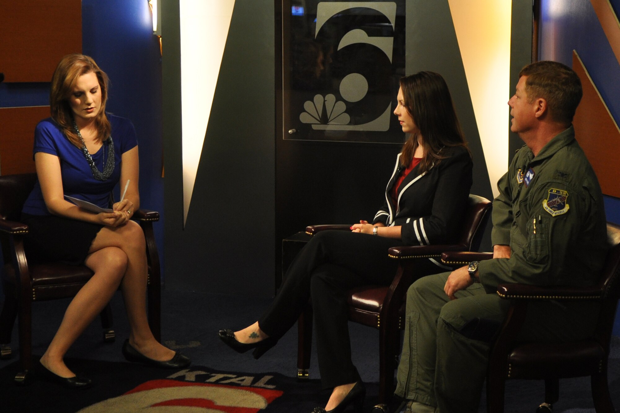 Ms. Jenna Zibton, anchor/reporter, KTAL News, prepares for her interview with Ms. Jennifer Wyly, communications director/military relations, Bossier Chamber of Commerce, and Col. Keith Schultz, commander, 307th Operations Group, Barksdale Air Force Base, La., at the KTAL News Channel 6 – NBC studios in Shreveport, La., May 19, 2011. Ms. Wyly and Col Schultz were interviewed about the upcoming Bossier Chamber’s Military Speaker Luncheon scheduled for Thursday, June 9th from 11 a.m. to 1 p.m., at Ralph & Kacoo’s in Bossier City, La. Colonel Schultz will be one of the featured speakers at the luncheon. (U.S. Air Force photo/Tech. Sgt. Jeff Walston) 