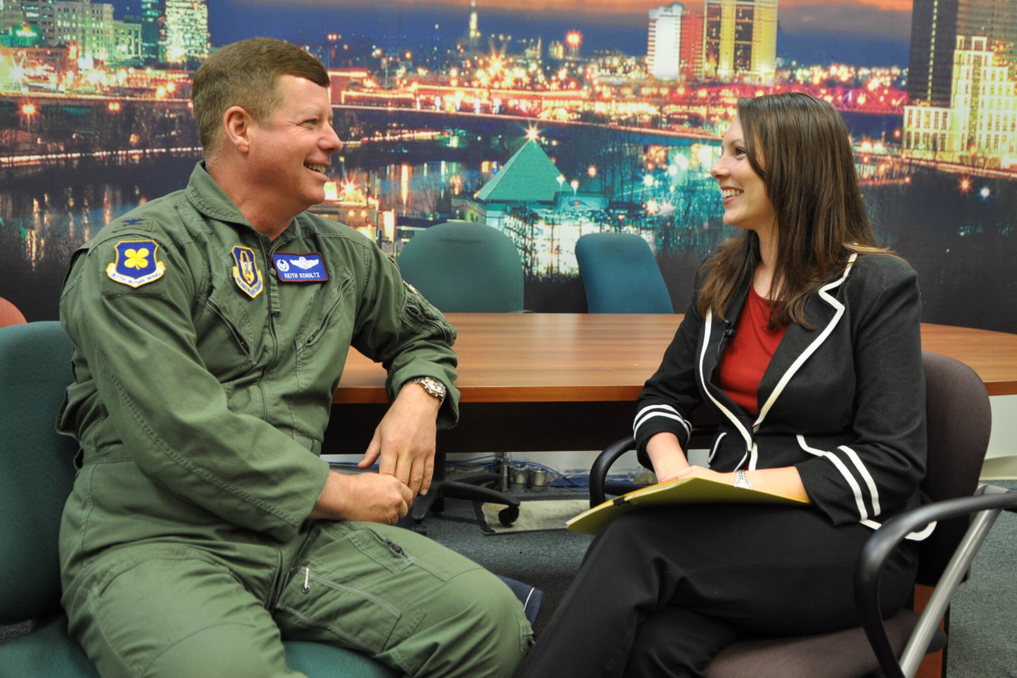 Col. Keith Schultz, commander, 307th Operations Group, Barksdale Air Force Base, La., discusses the future with Ms. Jennifer Wyly, communications director/military relations, Bossier Chamber of Commerce, before an on-air interview at the KTAL News Channel 6 – NBC studios in Shreveport, La., May 19, 2011. Col. Schultz and Ms Wyly were interviewed about the upcoming Bossier Chamber’s Military Speaker Luncheon scheduled for Thursday, June 9th from 11 a.m. to 1 p.m., at Ralph & Kacoo’s in Bossier City, La. Colonel Schultz will be one of the featured speakers at the luncheon. (U.S. Air Force photo/Tech. Sgt. Jeff Walston) 