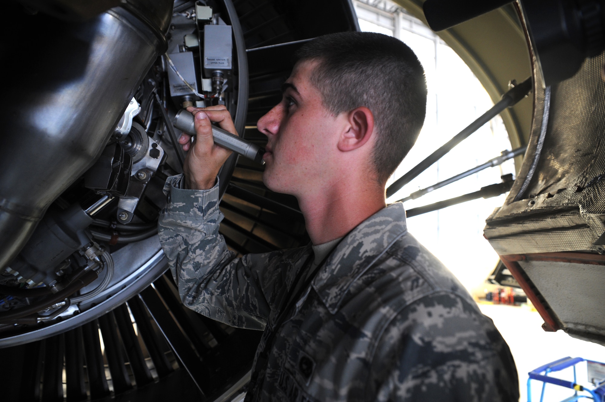 Senior Airman Joseph Whetstone performs an engine inspection during a Home Station Check inspection on a C-17 on Joint Base Charleston - Air Base, May 23. HSC is a three-day long inspection performed every 120 days. Airman Whetstone is a member of the HSC department of the 437th Maintenance Squadron. (U.S. Air Force photo/ Staff Sgt. Nicole Mickle)