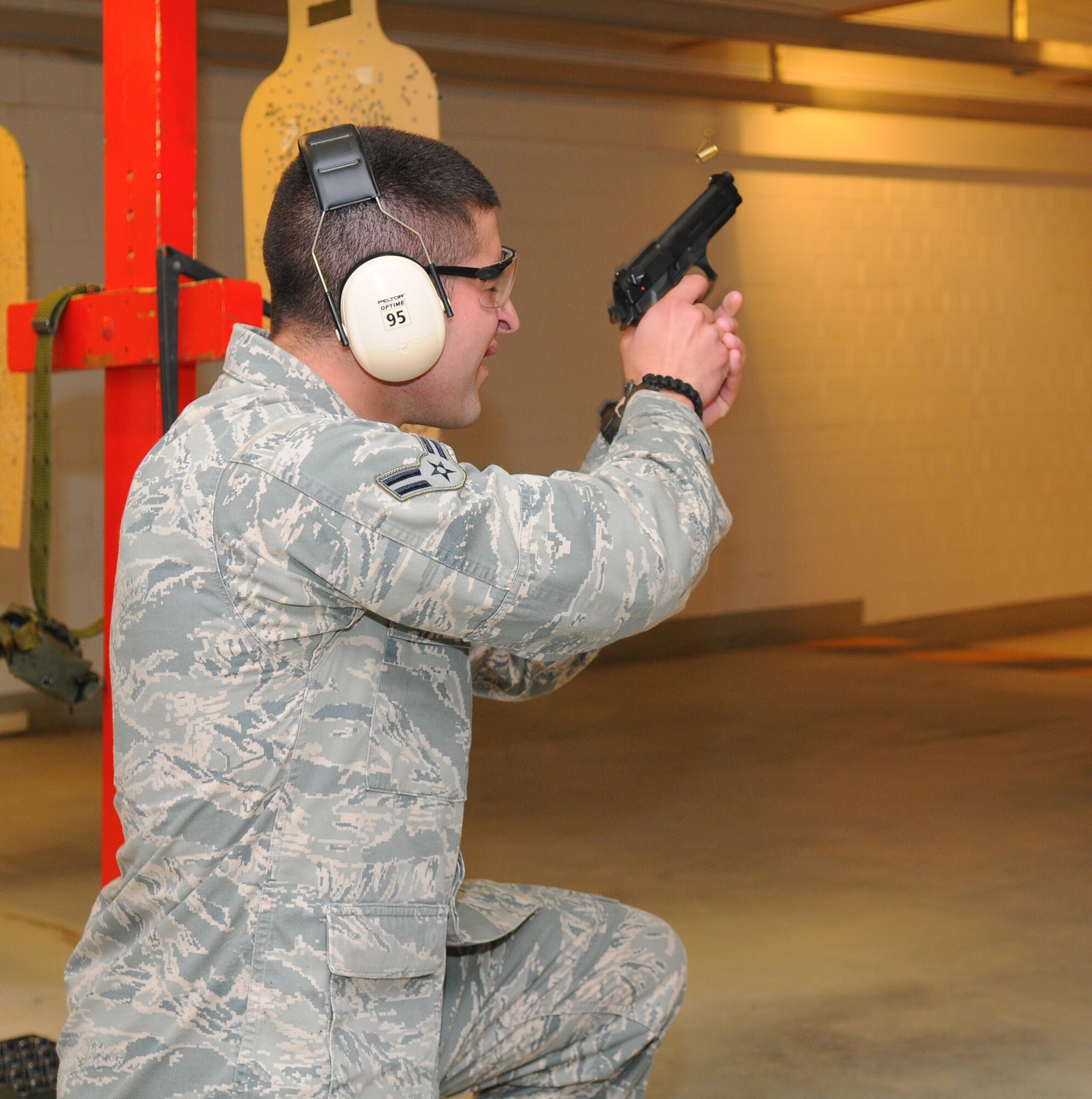 SPANGDAHLEM AIR BASE, Germany – Airman 1st Class Justin Ricketts, 52nd Security Forces Squadron, takes aim at a target during the firing range event of the 52nd SFS Decathlon here May 17. The 52nd SFS Decathlon consisted of five teams competing in 10 separate events. (U.S. Air Force photo/Airman 1st Class Dillon Davis)
